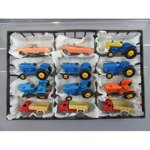 29 - MATCHBOX 1-75 Regular Wheels, group of 24 in plastic carry case to include 7x No.39 Ford Tractor, 4x... 