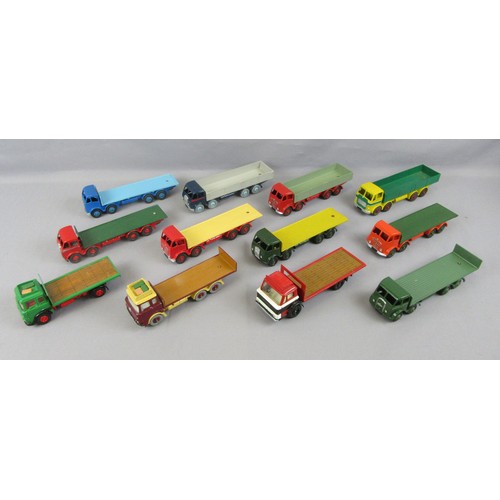 75 - DINKY SUPERTOYS, group of repainted Foden 8-wheel lorries, plus 3 modified examples. (12)