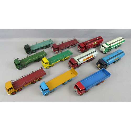 76 - DINKY SUPERTOYS, group of repainted Foden 8-wheel chain lorries and tankers. (11)