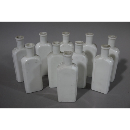 28 - A set of ten white glass flask-shaped bottles, 15.5cm high (10)