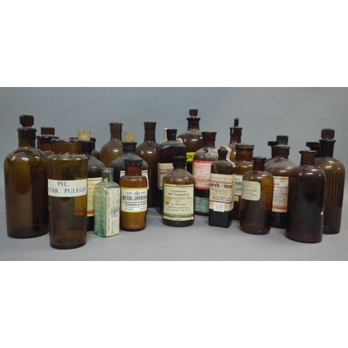 68 - A collection of brown glass pharmacy bottles and jars, including two sealed bottles of Guy's Tonic, ... 