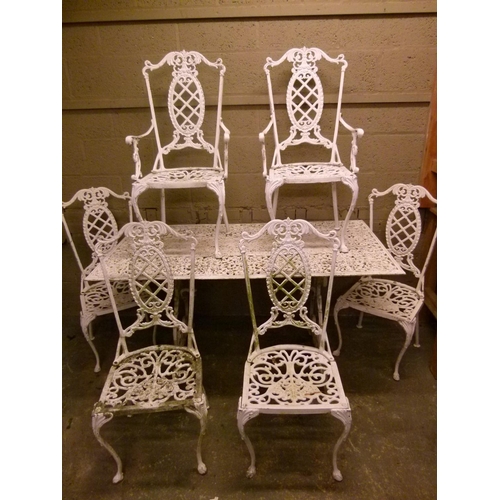 197 - A white painted metal garden set of rectangular pierced table, two carvers and four singles
