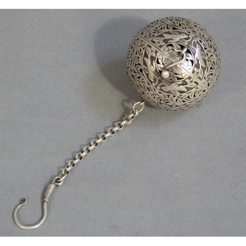 292 - A white metal gimbal incense burner carved with birds and leafage