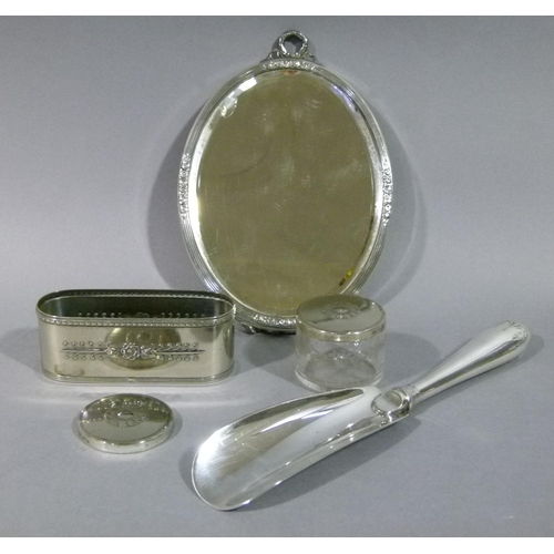 294 - A silver plated hand mirror (at fault), an etched glass and silver plate lidded toilet jar and an ex... 