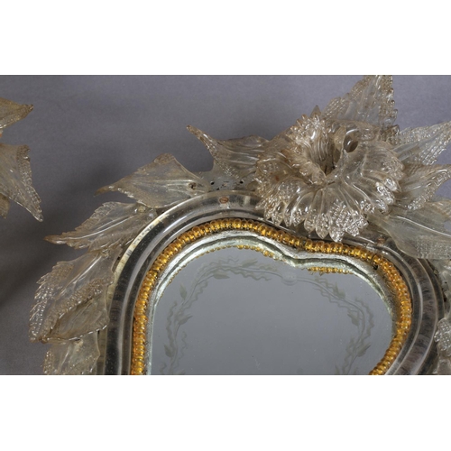 483 - A PAIR OF VENETIAN GLASS STRUT-BACKED SMALL MIRRORS, wheel engraved plates, each of waisted oval for... 