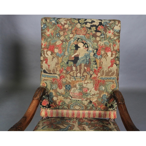 623 - A WALNUT OPEN ARMCHAIR, 17th century and later, the rectangular high back and seat upholstered in ne... 