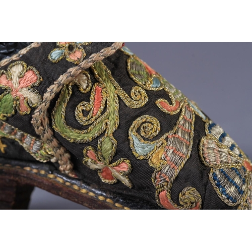 1 - A PAIR OF 17TH CENTURY CHILD'S SHOES embroidered in coloured silks and gilt metal thread with flower... 