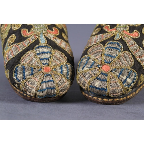 1 - A PAIR OF 17TH CENTURY CHILD'S SHOES embroidered in coloured silks and gilt metal thread with flower... 