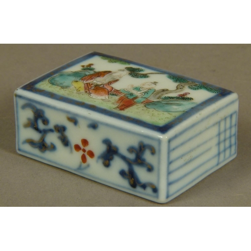 102 - AN 18TH CENTURY CHINESE SCROLL WEIGHT of rectangular form the top decorated with a scholar and stude... 