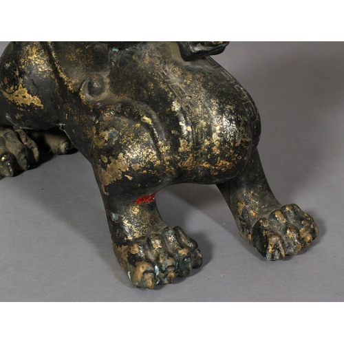 107B - A CHINESE BRONZED PATINATED METAL DOG OF FO, 70cm long x 49cm high