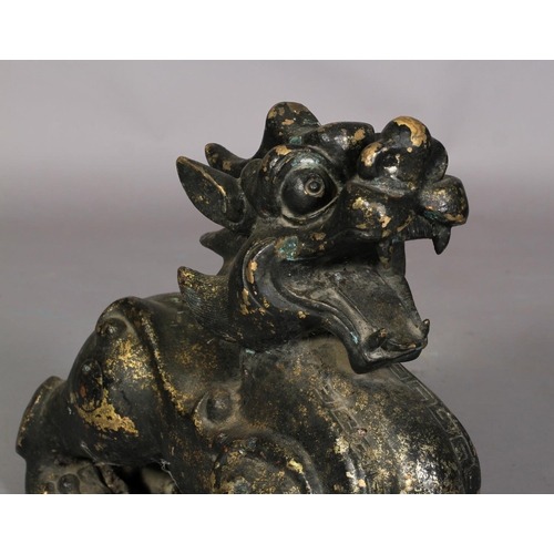 107B - A CHINESE BRONZED PATINATED METAL DOG OF FO, 70cm long x 49cm high