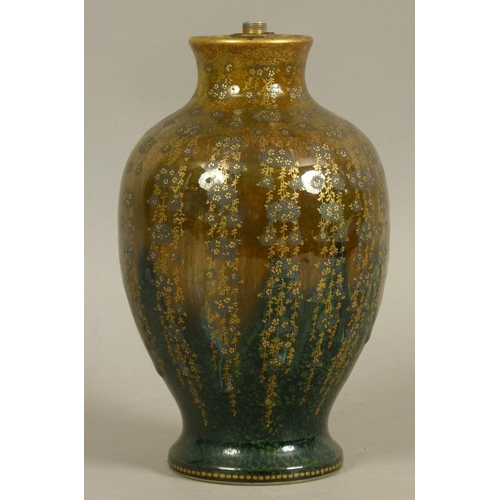 111 - A JAPANESE POTTERY VASE, Meiji period, of baluster form, the glazed dark green to brown ground paint... 