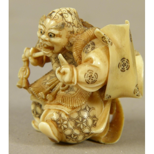 117 - A JAPANESE IVORY NETSUKE, MEIJI PERIOD, carved as a noh player wearing Shikami mask representing a d... 