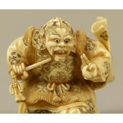 117 - A JAPANESE IVORY NETSUKE, MEIJI PERIOD, carved as a noh player wearing Shikami mask representing a d... 