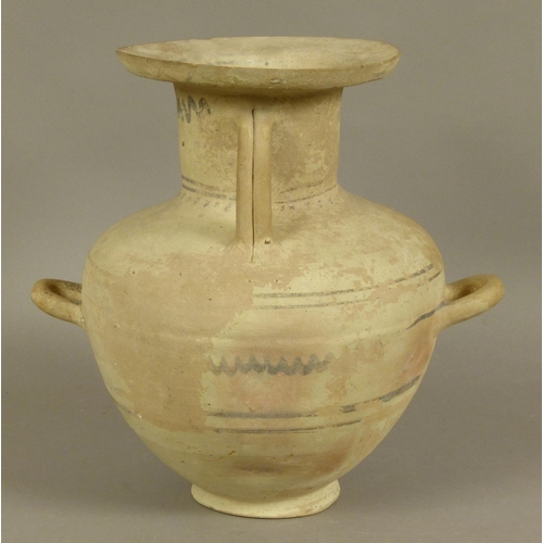 128 - AN ANCIENT GREEK OR SOUTHERN MEDITERRANEAN THREE HANDLED AMPHORA with cylindrical neck and wide rim,... 