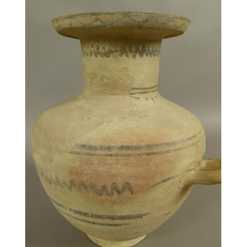 128 - AN ANCIENT GREEK OR SOUTHERN MEDITERRANEAN THREE HANDLED AMPHORA with cylindrical neck and wide rim,... 