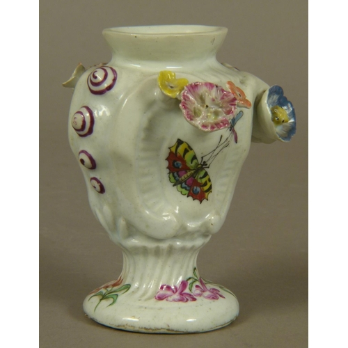 137 - A LONGTON MOULDED PORCELAIN ROCOCO SPILL VASE, the body floral encrusted and painted butterflies, th... 