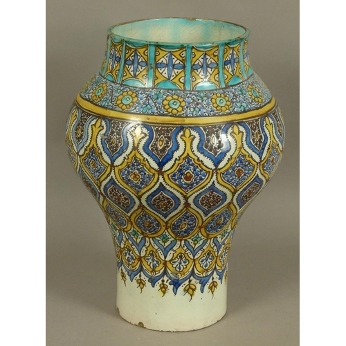 146 - A 19TH CENTURY TURKISH POTTERY BALUSTER VASE, the body decorated with boteh beneath shoulder of leav... 