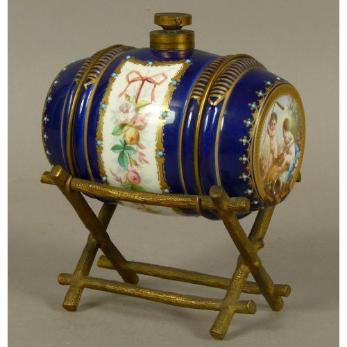 151 - A LATE 19TH CENTURY FRENCH PORCELAIN AND GILT-BRONZE MOUNTED SPIRIT BARREL, the porcelain barrel pai... 