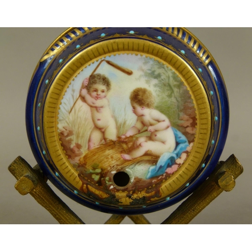 151 - A LATE 19TH CENTURY FRENCH PORCELAIN AND GILT-BRONZE MOUNTED SPIRIT BARREL, the porcelain barrel pai... 