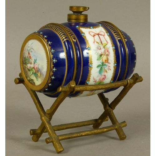 151 - A LATE 19TH CENTURY FRENCH PORCELAIN AND GILT-BRONZE MOUNTED SPIRIT BARREL, the porcelain barrel pai... 