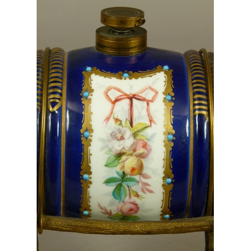 151 - A LATE 19TH CENTURY FRENCH PORCELAIN AND GILT-BRONZE MOUNTED SPIRIT BARREL, the porcelain barrel pai... 