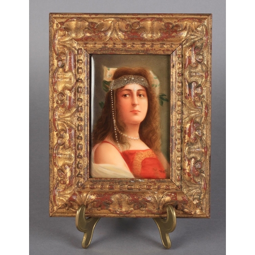 155 - A VIENNA PORCELAIN RECTANGULAR PLAQUE, painted with a head and shoulder portrait of Hiawatha by Wagn... 