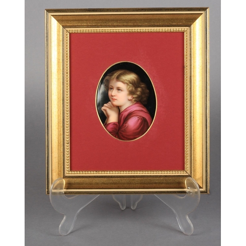 158 - A VIENNA PORCELAIN OVAL PORTRAIT PLAQUE, head and shoulders of an infant with its hands clasped, 12c... 