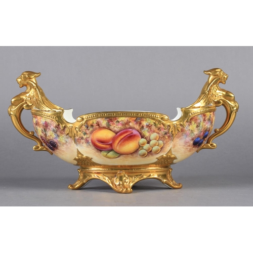 170 - A ROYAL WORCESTER STILL LIFE PAINTED TWO HANDLED PORCELAIN BOWL of oval form with gilt sphinx type h... 