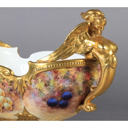 170 - A ROYAL WORCESTER STILL LIFE PAINTED TWO HANDLED PORCELAIN BOWL of oval form with gilt sphinx type h... 