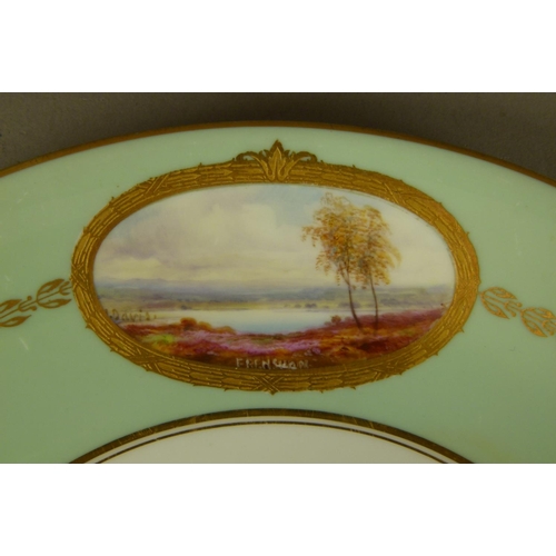 175 - A ROYAL WORCESTER CIRCULAR CABINET PLATE, the pale green rim with an oval reserve painted by Davis, ... 