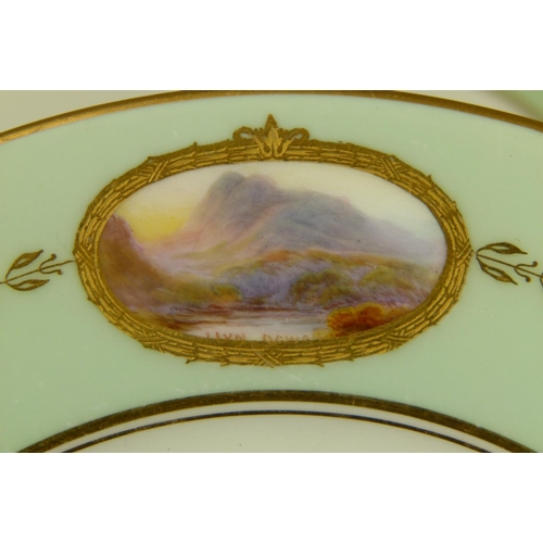 175 - A ROYAL WORCESTER CIRCULAR CABINET PLATE, the pale green rim with an oval reserve painted by Davis, ... 