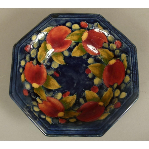 187 - A WALTER MOORCROFT POMEGRANATE DESIGN OCTAGONAL BOWL c.1945-49 tubelined and glazed in dark red and ... 