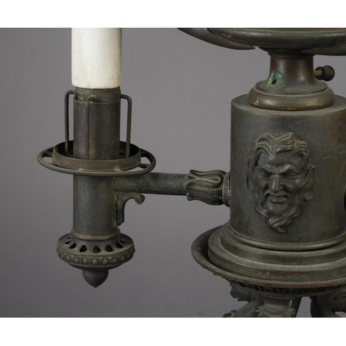 19 - A REGENCY BRONZE COLZA OIL TWIN BRANCH LAMP the two arms issuing from the socle of an urn with cover... 