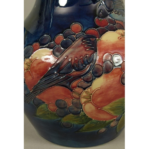 192 - A WALTER MOORCROFT FINCHES AND BERRIES DESIGN TWO HANDLED VASE c.1988 tubelined and glazed in pink a... 