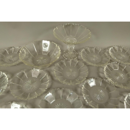 198 - A VICTORIAN GLASS DESSERT SERVICE of panelled form with cut serpentine shaped rims comprising twelve... 