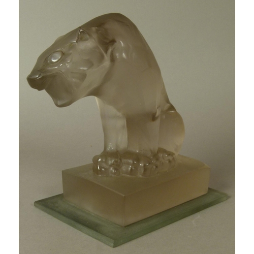 204 - AN ART DECO FROSTED GLASS SCULPTURE OF A LARGE PANTHER, sitting on a rectangular plinth base, 19cm h... 