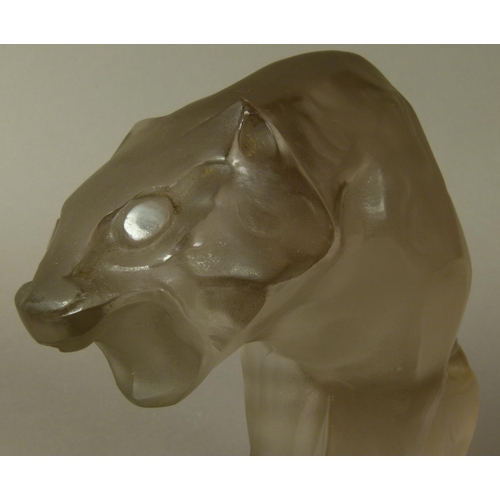 204 - AN ART DECO FROSTED GLASS SCULPTURE OF A LARGE PANTHER, sitting on a rectangular plinth base, 19cm h... 