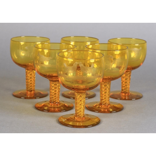 205 - A SET OF SIX AMBER GLASS SMALL WINES each bowl wheel engraved with a cockfighting scene, tapered air... 