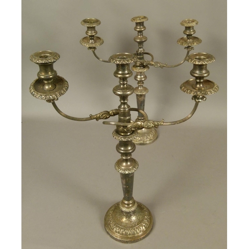 210 - A PAIR OF VICTORIAN SILVER PLATED THREE-LIGHT CANDELABRA, having twin reeded and foliate arms, folia... 