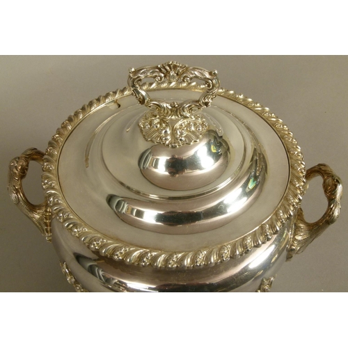 219C - A PLATED ON COPPER SOUP TUREEN AND SEMI-DOMED COVER with leaf-capped handle, and pair of handles, ga... 