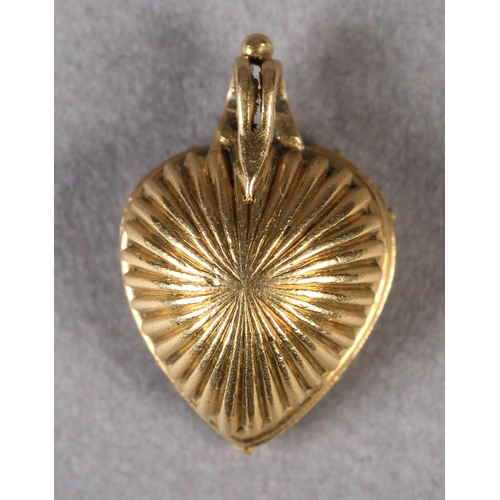 220 - A LATE 17TH CENTURY GOLD AND ROCK CRYSTAL MOURNING PENDANT the heart-shape enclosing the crowned ini... 