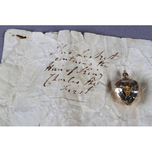 220 - A LATE 17TH CENTURY GOLD AND ROCK CRYSTAL MOURNING PENDANT the heart-shape enclosing the crowned ini... 