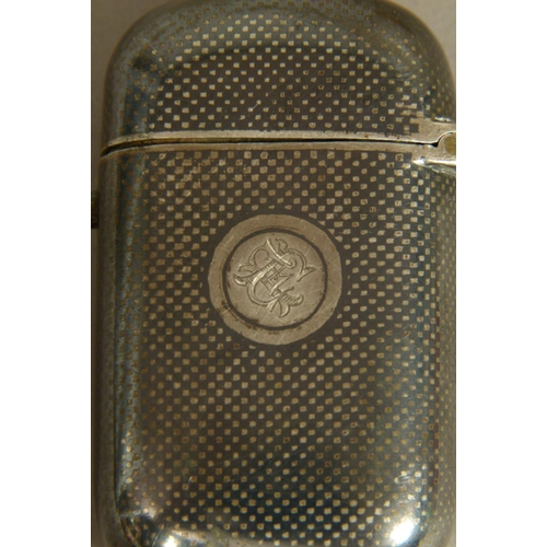 235 - A RUSSIAN SILVER NIELLO VESTA CASE of rounded rectangular form, the front decorated with a church, t... 