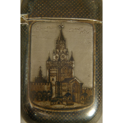 235 - A RUSSIAN SILVER NIELLO VESTA CASE of rounded rectangular form, the front decorated with a church, t... 