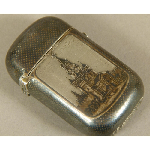 235 - A RUSSIAN SILVER NIELLO VESTA CASE of rounded rectangular form, the front decorated with a church, t... 