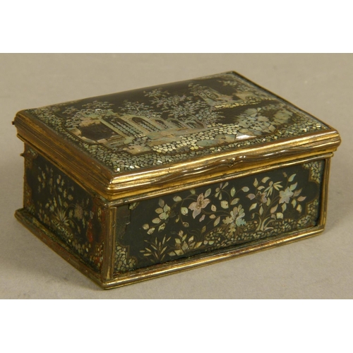 243 - AN 18TH CENTURY ORMOLU MOUNTED RECTANGULAR SMALL BOX, the hinged lid finely inlaid in mother of pear... 