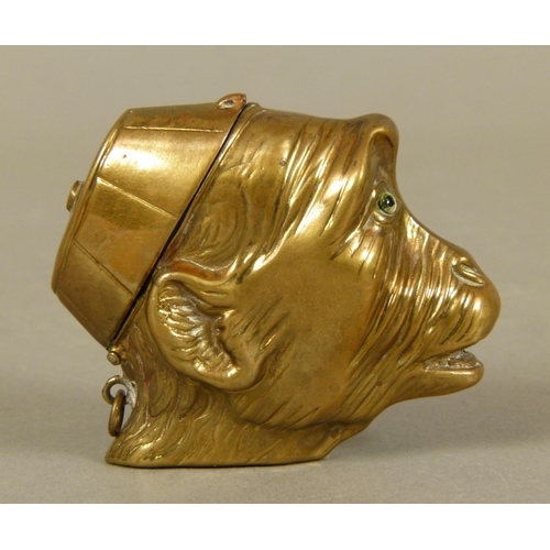 247 - A VICTORIAN BRASS MONKEY HEAD VESTA, hinged lid as a cap, realistically embossed with fur, open mout... 