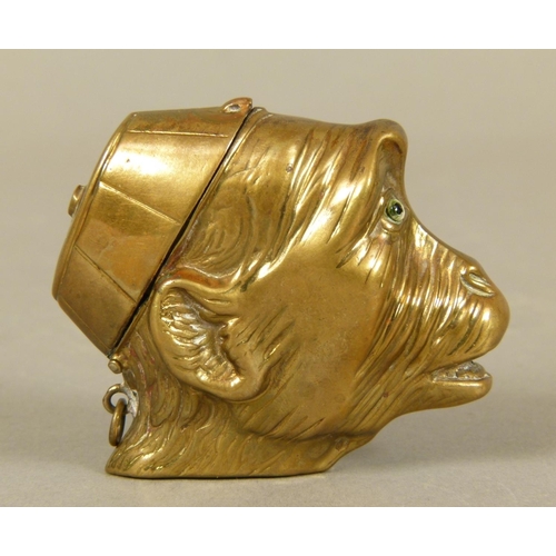 247 - A VICTORIAN BRASS MONKEY HEAD VESTA, hinged lid as a cap, realistically embossed with fur, open mout... 