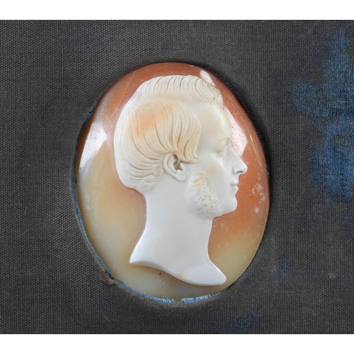 252 - A FINE PAIR OF LATE 19TH/EARLY 20TH CENTURY OVAL SHELL CAMEOS, portrait heads of a gentleman and his... 